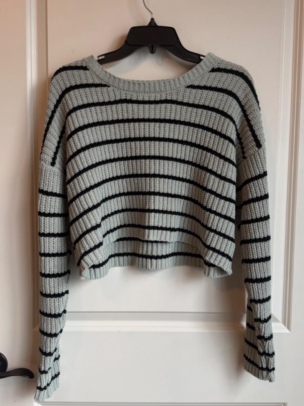 Medium cropped knitted green sweater with black stripes from Belle Du Jour